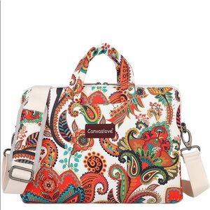 Like new paisley print laptop bag. Used once!